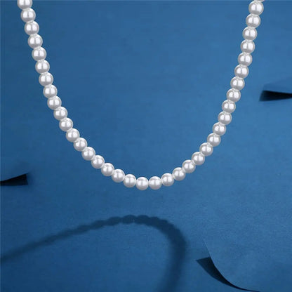 Collier Ras-du-Cou Perles Blanches – Style Unisexe & Tendance