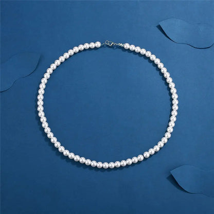 Collier Ras-du-Cou Perles Blanches – Style Unisexe & Tendance